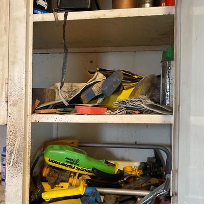 Top cabinet full of items