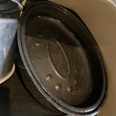 Large grey tote with griddle, kettle & pots