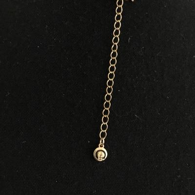 1946 gold toned, layered rhinestone cross fashion necklace