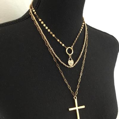 1946 gold toned, layered rhinestone cross fashion necklace