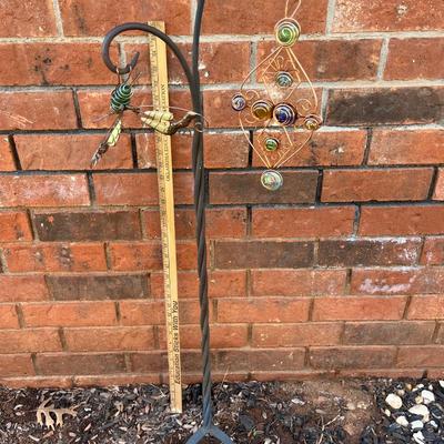 Iron plant holder