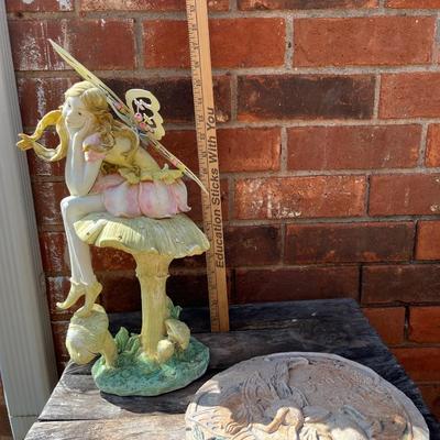 Fairy statue and stepping stone