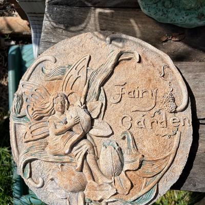 Fairy statue and stepping stone