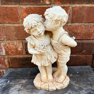 Boy kissing girl