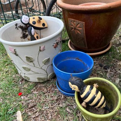 Assorted planters and cart