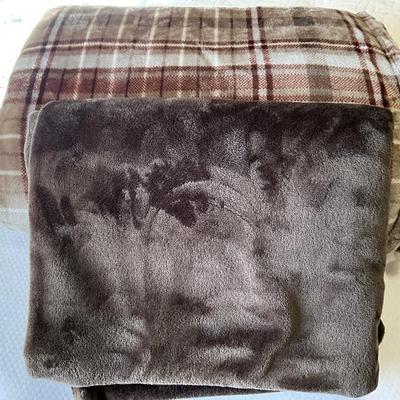 Two very soft throw, brown smaller, checked queen size.