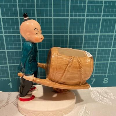 Occupied Japan man with wheelbarrow planter