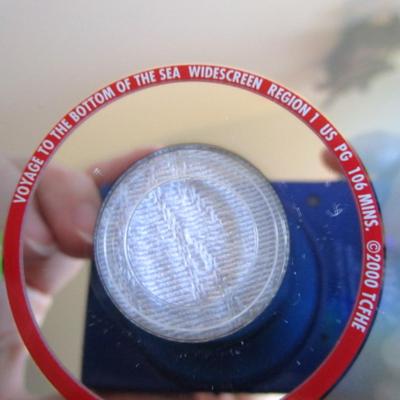 4 Sci-Fi movies (3 DVDs, one is two-sided)