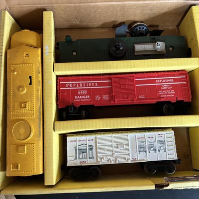 LOT 641: Lionel Train Set: Union Pacific Locomotive #1065, Savings Back Box Car #6050 Bank/Train Car, Explosives Box Car #6470, Flatbed...