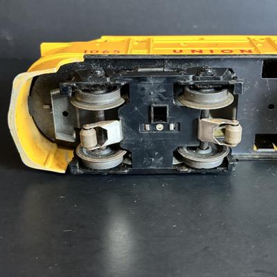 LOT 641: Lionel Train Set: Union Pacific Locomotive #1065, Savings Back Box Car #6050 Bank/Train Car, Explosives Box Car #6470, Flatbed...
