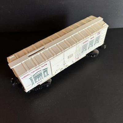 LOT 641: Lionel Train Set: Union Pacific Locomotive #1065, Savings Back Box Car #6050 Bank/Train Car, Explosives Box Car #6470, Flatbed...