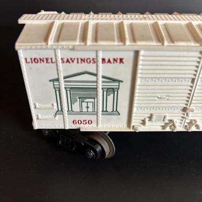LOT 641: Lionel Train Set: Union Pacific Locomotive #1065, Savings Back Box Car #6050 Bank/Train Car, Explosives Box Car #6470, Flatbed...