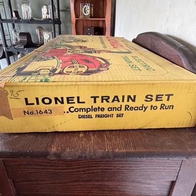 LOT 641: Lionel Train Set: Union Pacific Locomotive #1065, Savings Back Box Car #6050 Bank/Train Car, Explosives Box Car #6470, Flatbed...