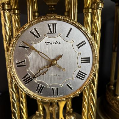 LOT 644: Vintage Anniversary Clocks: Master 400-Day (14"w/Dome) & Nisshin Master 400-day (16" w/Dome)