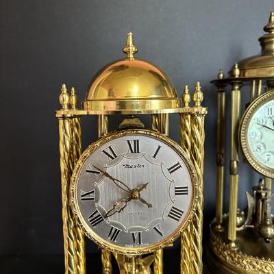 LOT 644: Vintage Anniversary Clocks: Master 400-Day (14"w/Dome) & Nisshin Master 400-day (16" w/Dome)