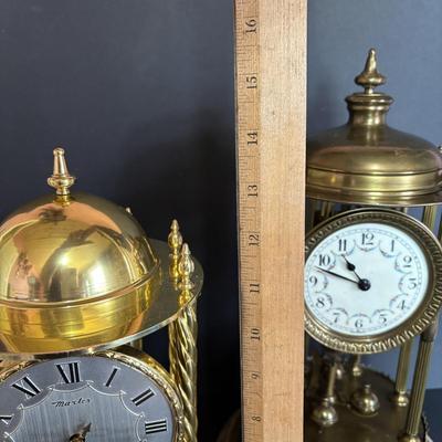 LOT 644: Vintage Anniversary Clocks: Master 400-Day (14"w/Dome) & Nisshin Master 400-day (16" w/Dome)