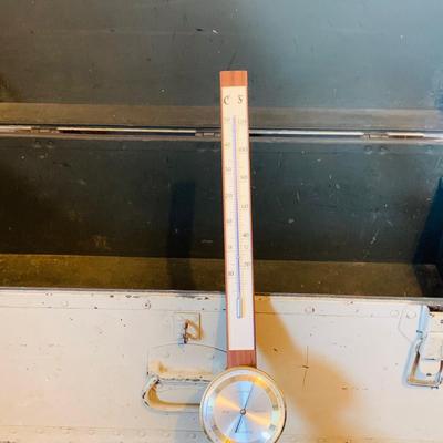 LOT 664: Doehler White Foot Locker, GE Electric Westminster Chime Mantle Clock, Air Guide Wood Wall Weather Station and Banjo Barometer