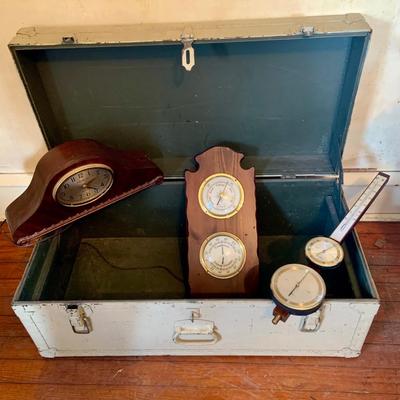 LOT 664: Doehler White Foot Locker, GE Electric Westminster Chime Mantle Clock, Air Guide Wood Wall Weather Station and Banjo Barometer