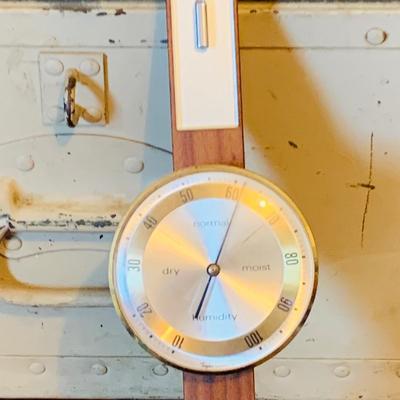 LOT 664: Doehler White Foot Locker, GE Electric Westminster Chime Mantle Clock, Air Guide Wood Wall Weather Station and Banjo Barometer