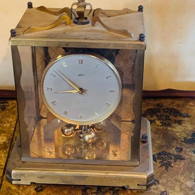 LOT 666: Three Side Tables, Three Anniversary Clocks, an Hourglass and a Lamp