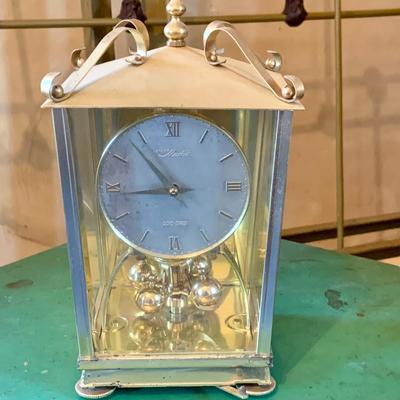LOT 666: Three Side Tables, Three Anniversary Clocks, an Hourglass and a Lamp