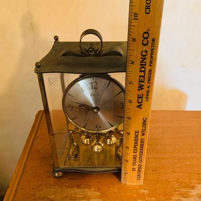 LOT 666: Three Side Tables, Three Anniversary Clocks, an Hourglass and a Lamp
