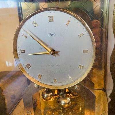 LOT 666: Three Side Tables, Three Anniversary Clocks, an Hourglass and a Lamp