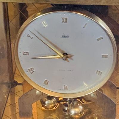 LOT 666: Three Side Tables, Three Anniversary Clocks, an Hourglass and a Lamp