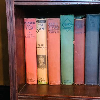 LOT 667: Bookcase with Classic Books, Mantle Weather Station, Side Table with Shelf and Anniversary Clock