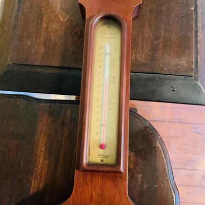 LOT 668: Wooden Side Table and a Banjo Barometer