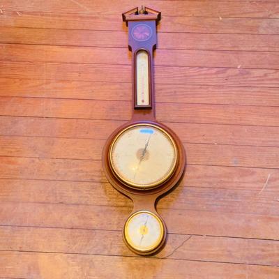 LOT 668: Wooden Side Table and a Banjo Barometer