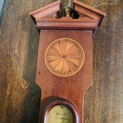 LOT 668: Wooden Side Table and a Banjo Barometer