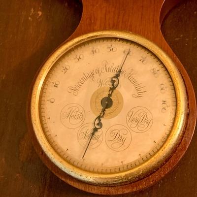 LOT 668: Wooden Side Table and a Banjo Barometer