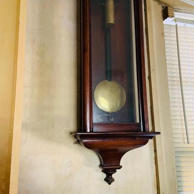 LOT 670: Large Wood Pendulum Wall Clock