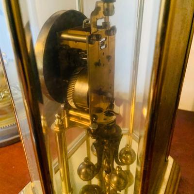 LOT 660: Three Anniversary Clocks by Kundo, Schultz and Other