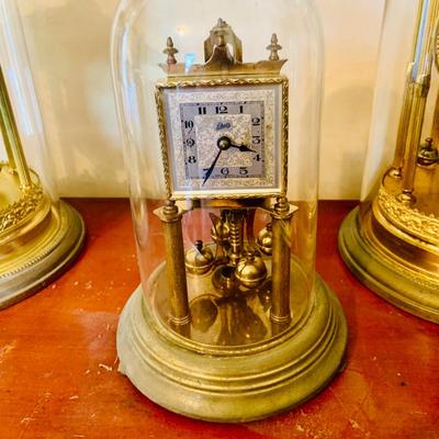 LOT 660: Three Anniversary Clocks by Kundo, Schultz and Other
