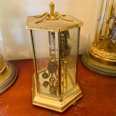 LOT 660: Three Anniversary Clocks by Kundo, Schultz and Other