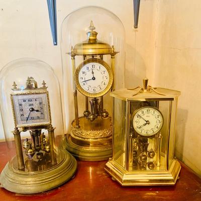 LOT 660: Three Anniversary Clocks by Kundo, Schultz and Other