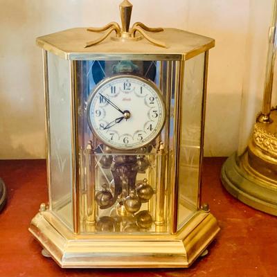 LOT 660: Three Anniversary Clocks by Kundo, Schultz and Other