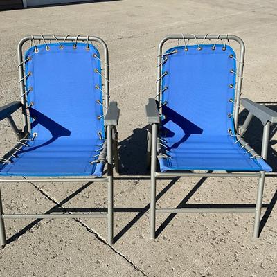 Two folding outdoor chairs, looks new