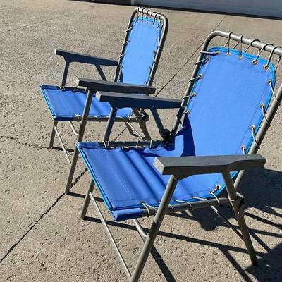 Two folding outdoor chairs, looks new