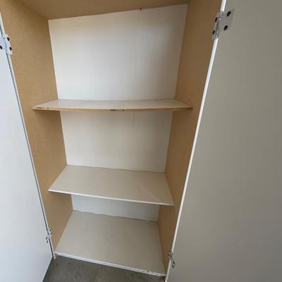 White storage unit w/doors