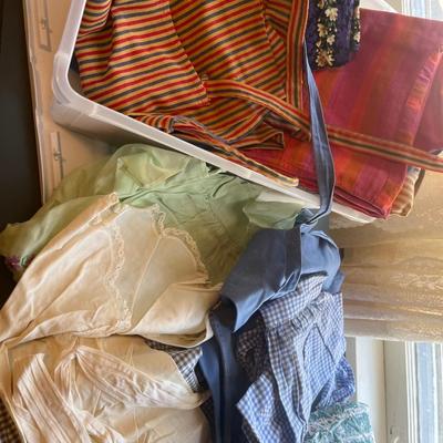Small tote of vintage aprons
