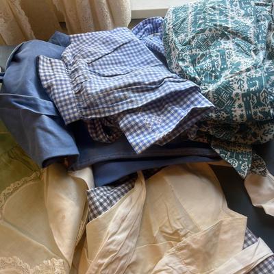 Small tote of vintage aprons