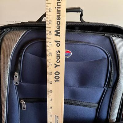 American Tourists luggage, looks new