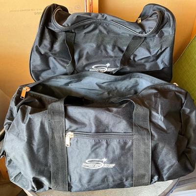 Shooting Star duffle bags, one on wheels