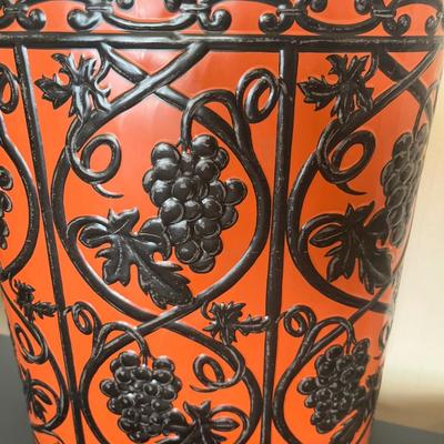 Mexican art, wool rug, and vintage trashcan