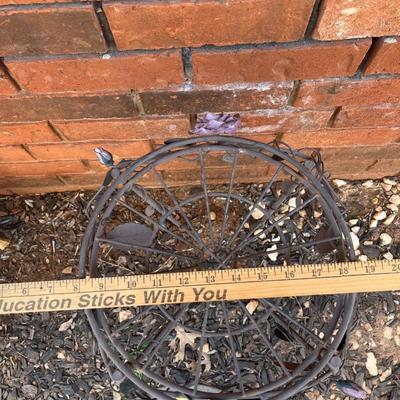 Iron plant stand with roses