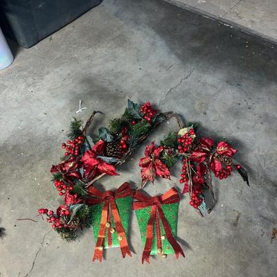 Poinsettia garland and metal presents