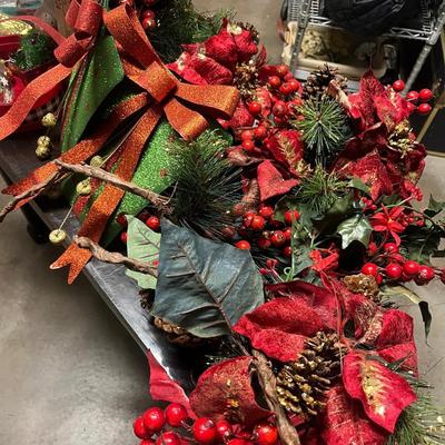 Poinsettia garland and metal presents